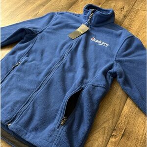 Crossland Men’s Blue Fleece QUALICARE HOME CARE embroidery